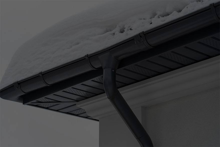 Snow and ice stuck in gutters